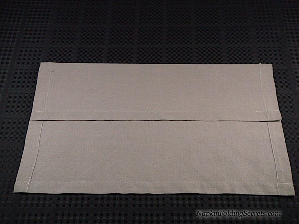 How to Fold the House with a Dinner Napkin 1 Cathedral style napkin folding step 1