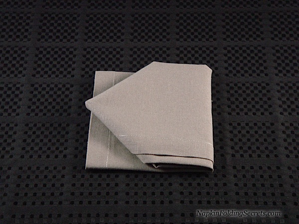 How to Fold the House with a Dinner Napkin 6 Cathedral style napkin folding step 6